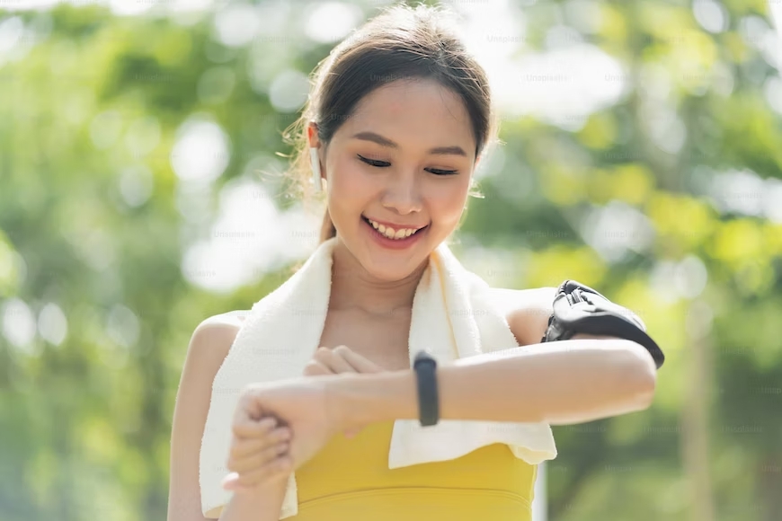 A girl wearing fitness tracker